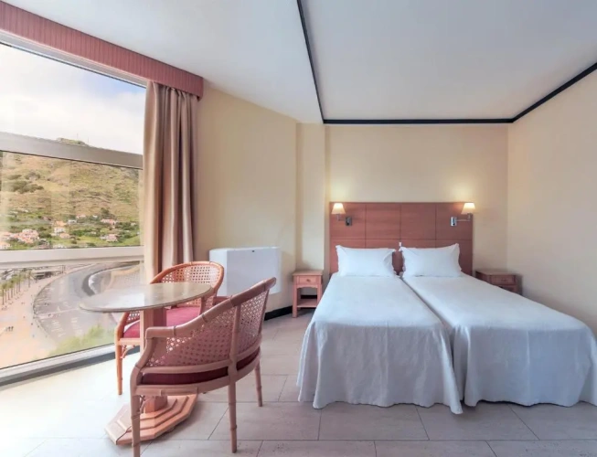 Triple room with garden view