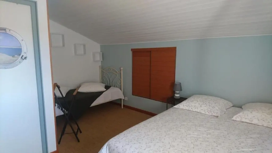 Standard Triple room with garden view