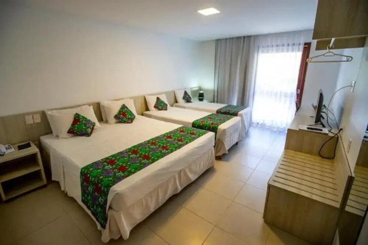 Standard Triple room with garden view