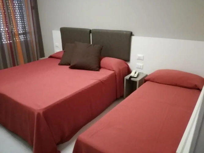Standard Triple room with balcony