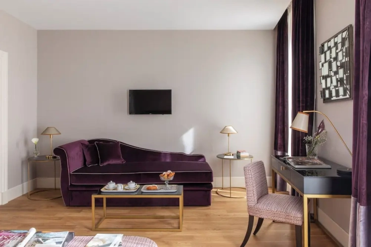 Deluxe Quadruple room with balcony and with city view