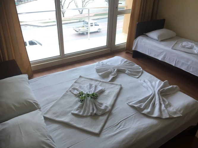 Standard Quadruple room with balcony and with city view
