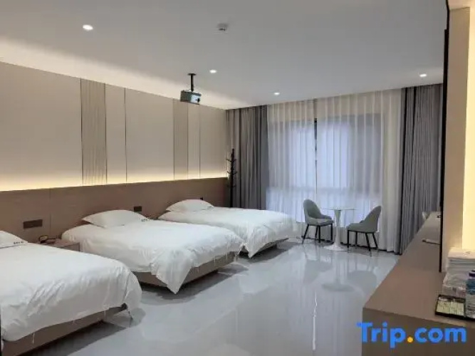 Mile Xinyuan Hotel