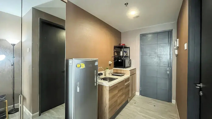 Earth Toned Studio Apartment Collins Boulevard