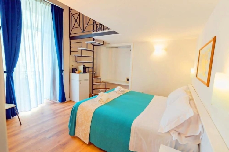 Comfort Quadruple room with courtyard view