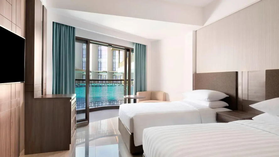 Standard Twin room with balcony and with pool view