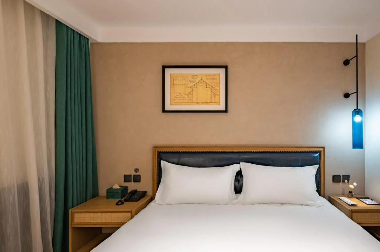 Qiuguo Hutong Courtyard Hotel