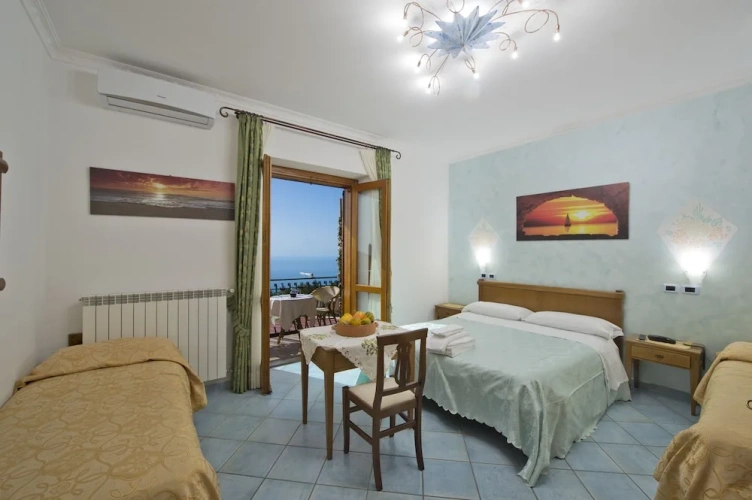 Standard Quadruple room with balcony and with sea view