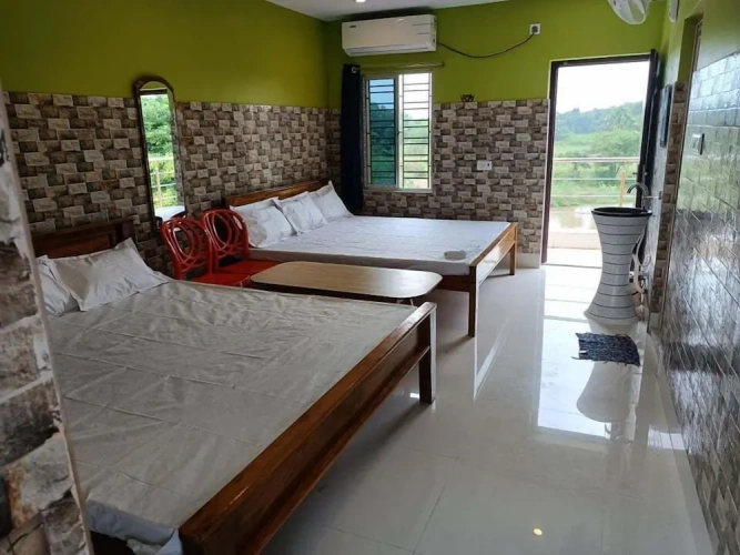 Standard Quadruple Family room with balcony and with garden view
