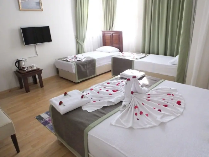 1 Bedroom Deluxe Quadruple room with city view