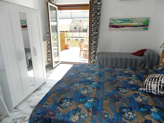 Standard Quadruple room with balcony and with city view