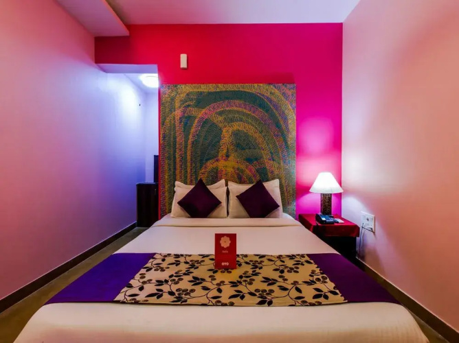 Oyo 5673 Maximum Holiday Inn Rooms