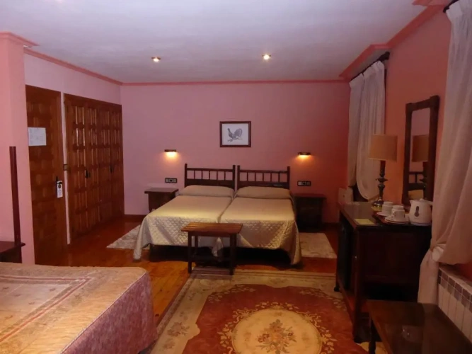 Standard Quadruple room with garden view