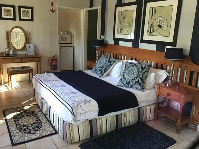 Standard Triple room with garden view