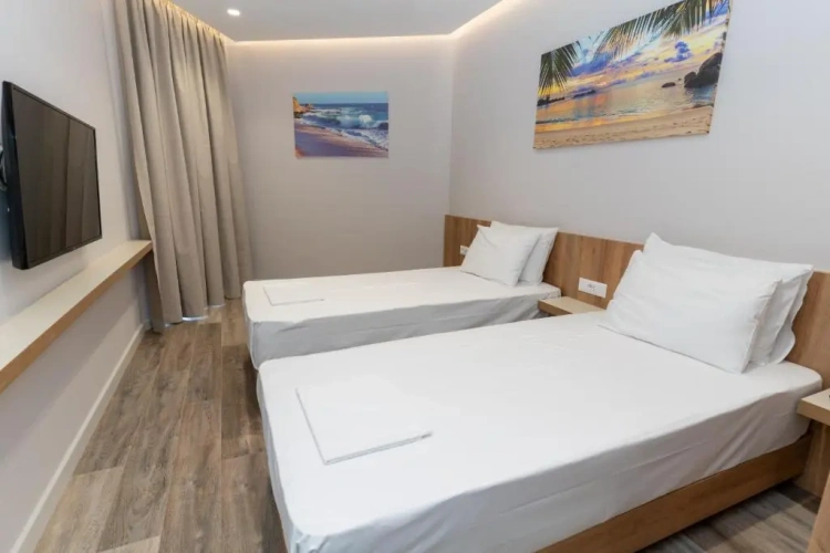 Standard Twin room with partial sea view