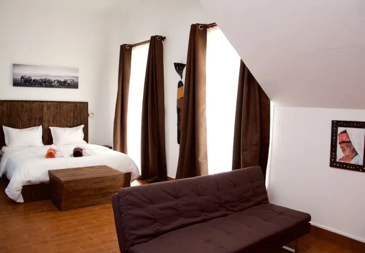 Standard Triple room with balcony and with garden view
