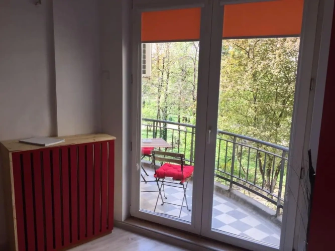 Apartment with balcony and with garden view