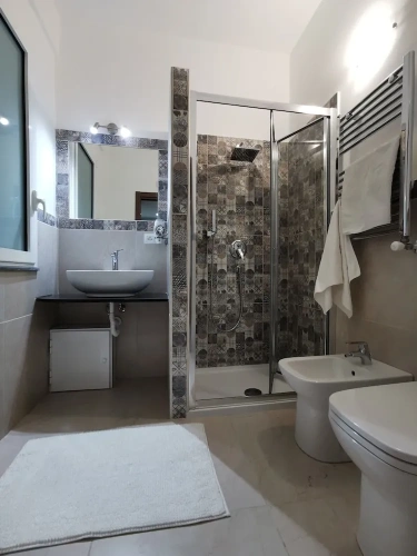 Standard Triple room with garden view