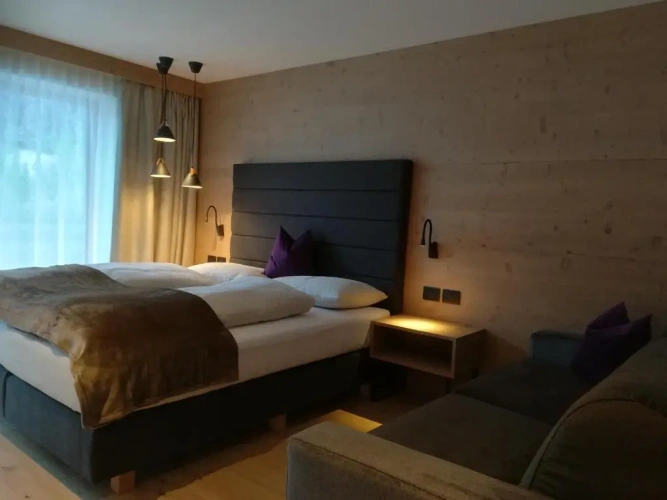 Deluxe Quadruple room with balcony