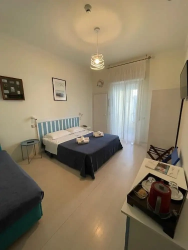 Standard Quadruple room with balcony