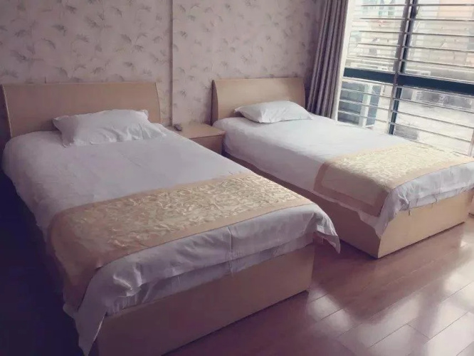 Wanhao Bussiness Hotel Siyang