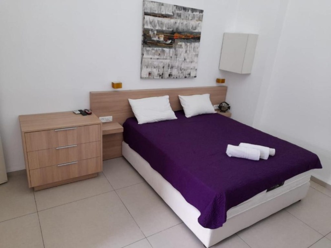 Standard Quadruple room with garden view