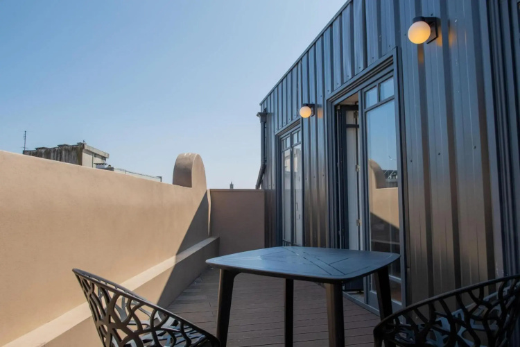 Spacious Studio w/ Balcony & AC by LovelyStay