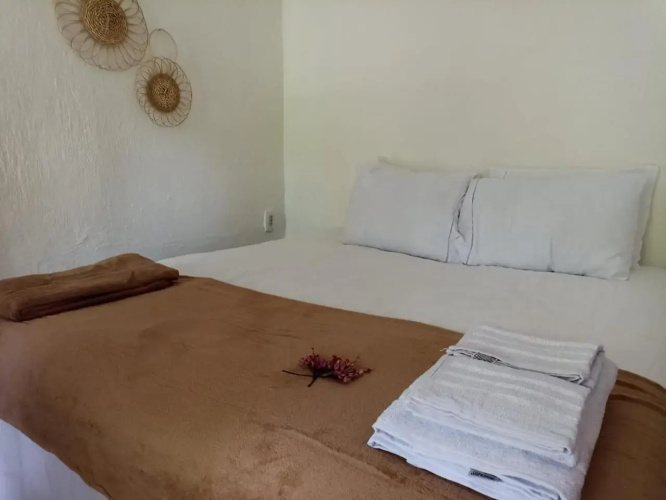Canoa Hostel e Suites