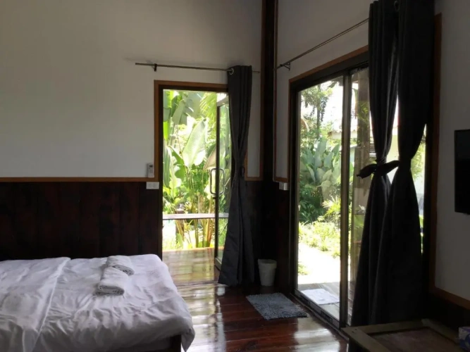 Standard Quadruple room with garden view