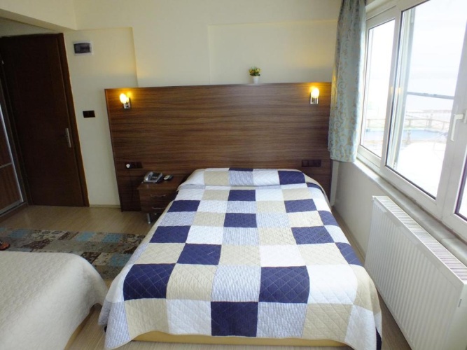 Standard Quadruple room with sea view