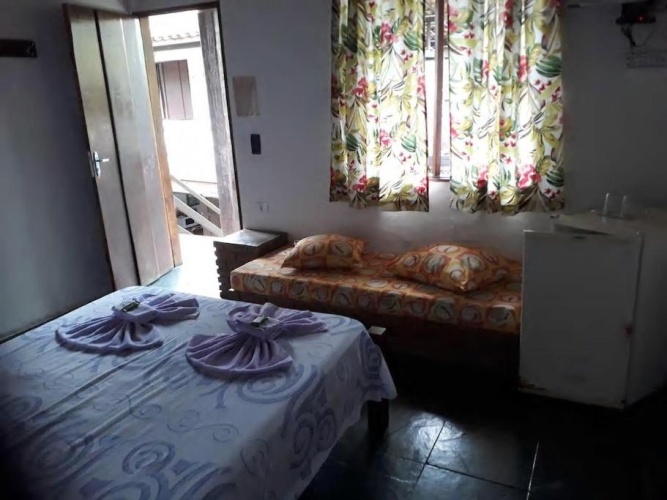 Standard Triple room with garden view