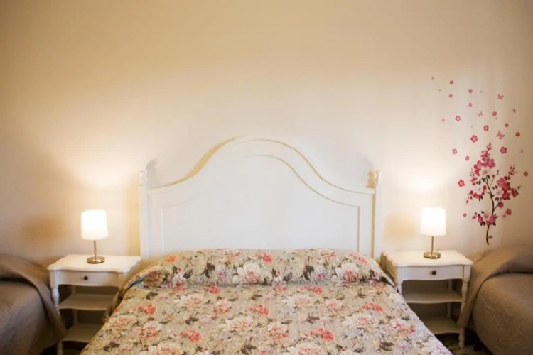 Standard Quadruple room with garden view