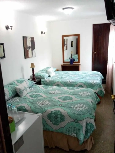 Standard Quadruple room with courtyard view
