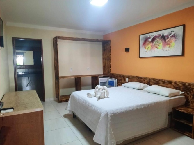 Standard Triple room with garden view