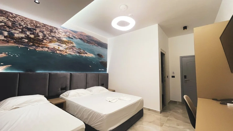 Standard Quadruple room with balcony and with pool view