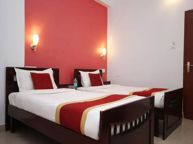SR Legend Inn by OYO Rooms