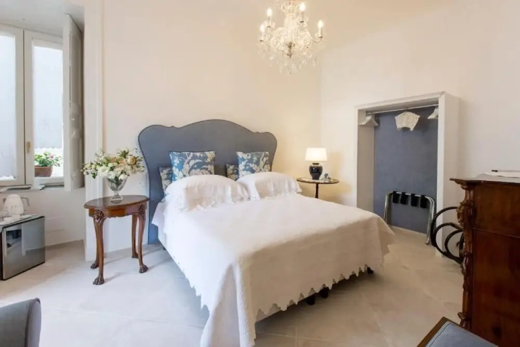 Deluxe Triple room with balcony and with garden view