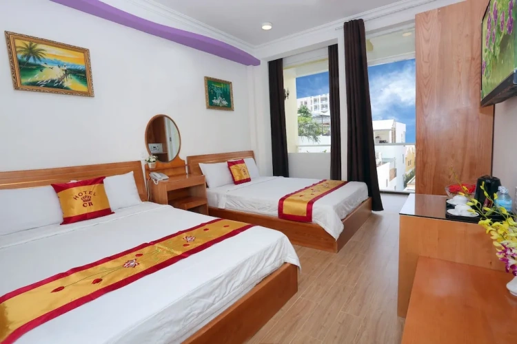 Deluxe Quadruple room with balcony