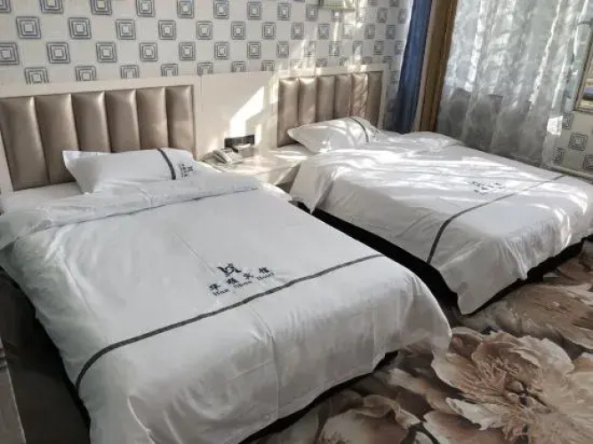 Urumqi Xinhuashun Hotel