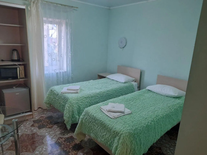 Фотография номера гостевого дома На Лугу