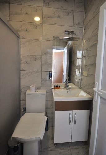 Deluxe Quadruple room with balcony and with partial sea view