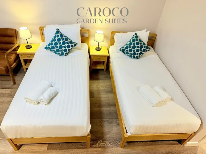 Twin Suite with balcony and with garden view