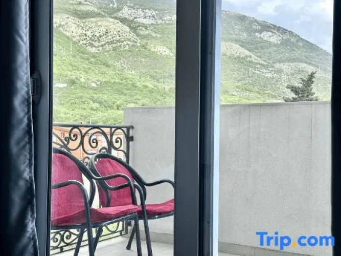 Comfort Quadruple room with balcony and with mountain view