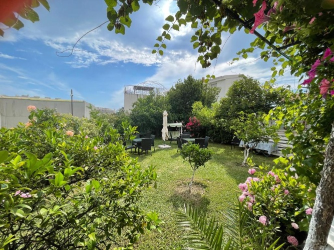 Standard Triple room with garden view