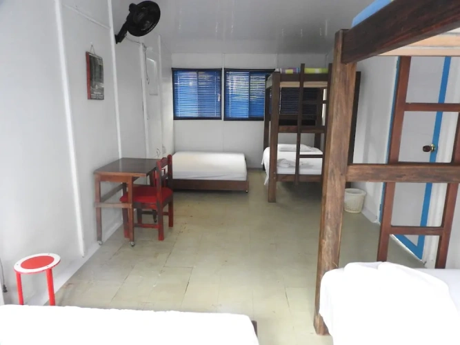 Standard Triple room with garden view