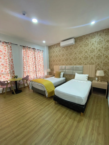 July Apartments
