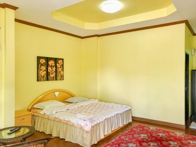 Deluxe Triple Family room with garden view