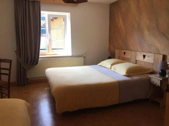Standard Triple room with garden view