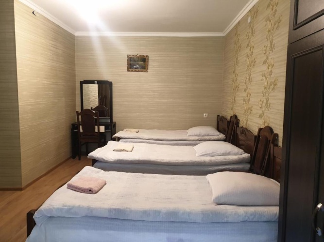 Standard Triple room with garden view