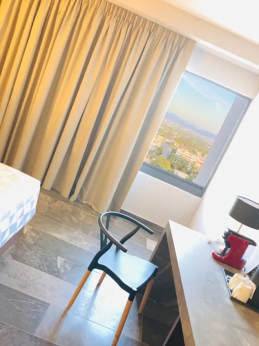 Deluxe Quadruple room with city view